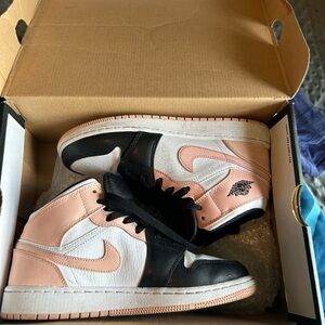 Air Jordan 1 Mid Pink and Black Sneakers